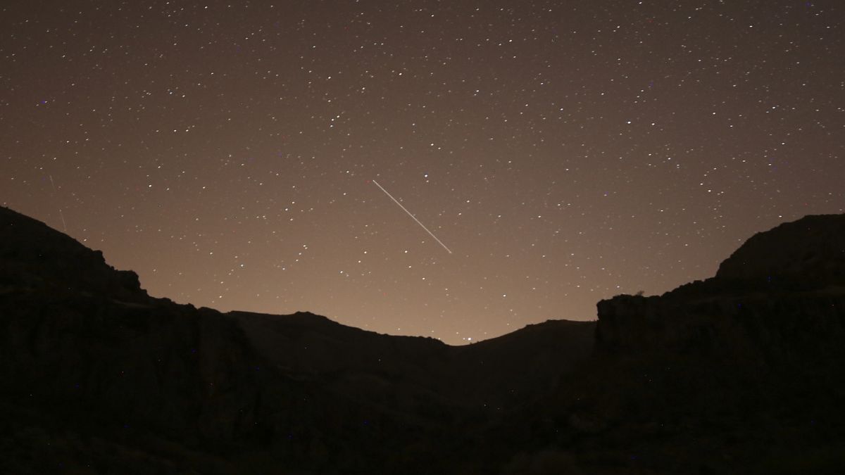 leonid meteor streaks through the sky.