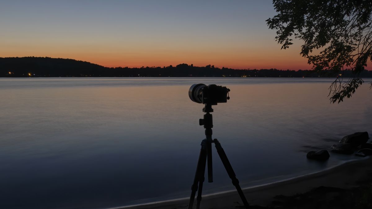 Best lenses for astrophotography: Image shows camera pointing at sunset