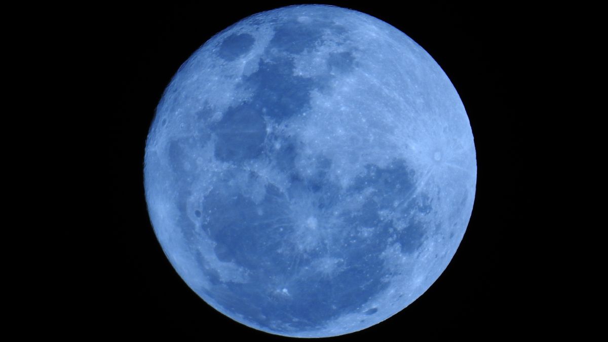 a blue-colored moon in the sky