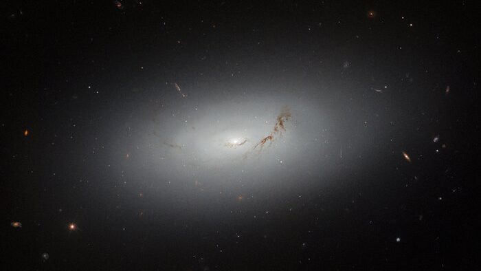 Hubble telescope spots glowing galactic disk in deep space (photo)
